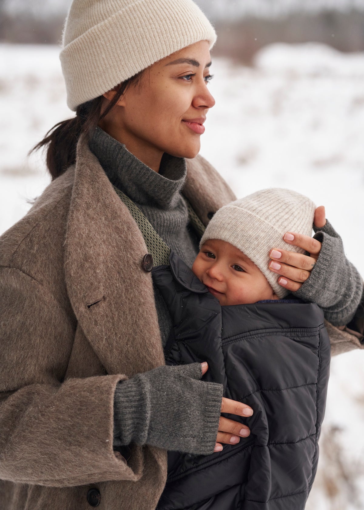 BabyBjorn Winter Cover in use over a baby carrier
