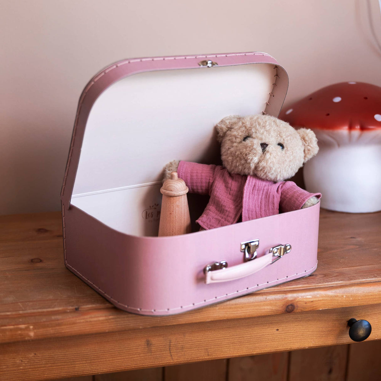 Morrissette With Clothes In A Case