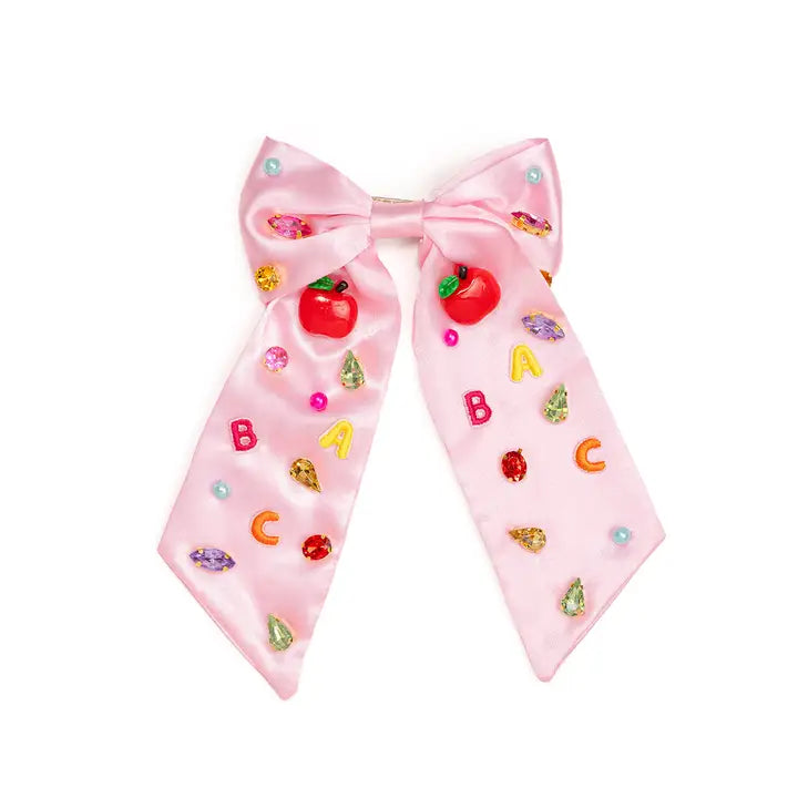 Cute gemstone hair bow clip for kids, perfect for back-to-school season