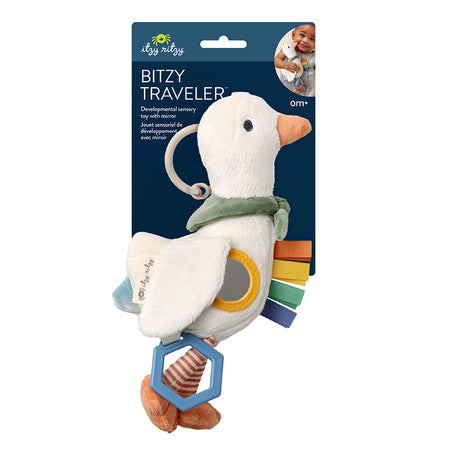 Attachable baby toy with natural cotton and minky velour fabrics, featuring crinkle wings, jingling rings, and dangling textures for tactile and auditory sensory exploration.
