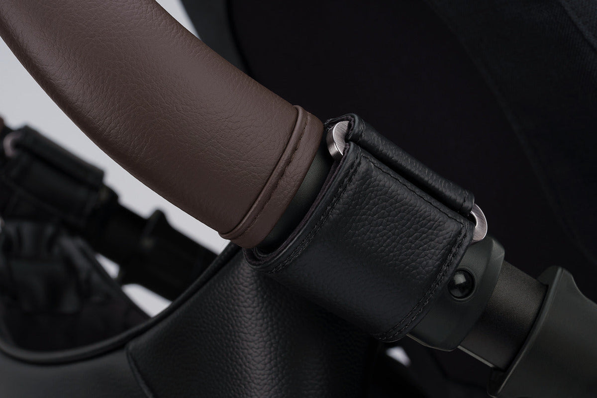 Nuna Leatherette Stroller Organizer Caviar pushbar strap detail