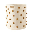 Pehr pom pom decorated laundry basket hamper, stylish and practical for nursery storage and organizing clothes