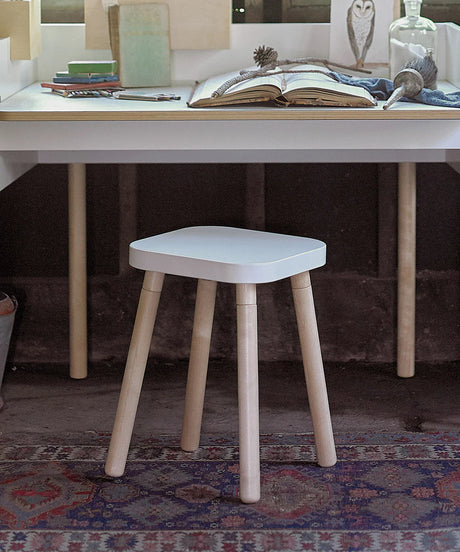 Square stool with sturdy wooden design, versatile seating for kids' rooms or play areas