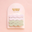 Two wavy hair clips in misty matte finish, designed for effortless half-up hairstyles and securing thick hair without slippage.