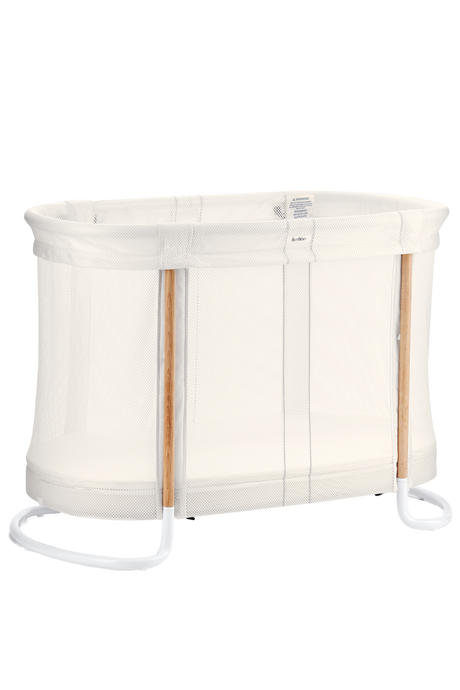 BabyBjörn Baby Crib in white with mesh sides