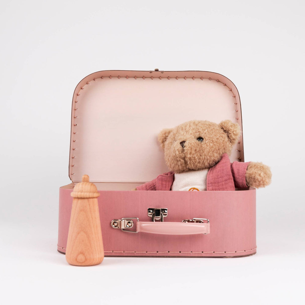 Morrissette With Clothes In A Case