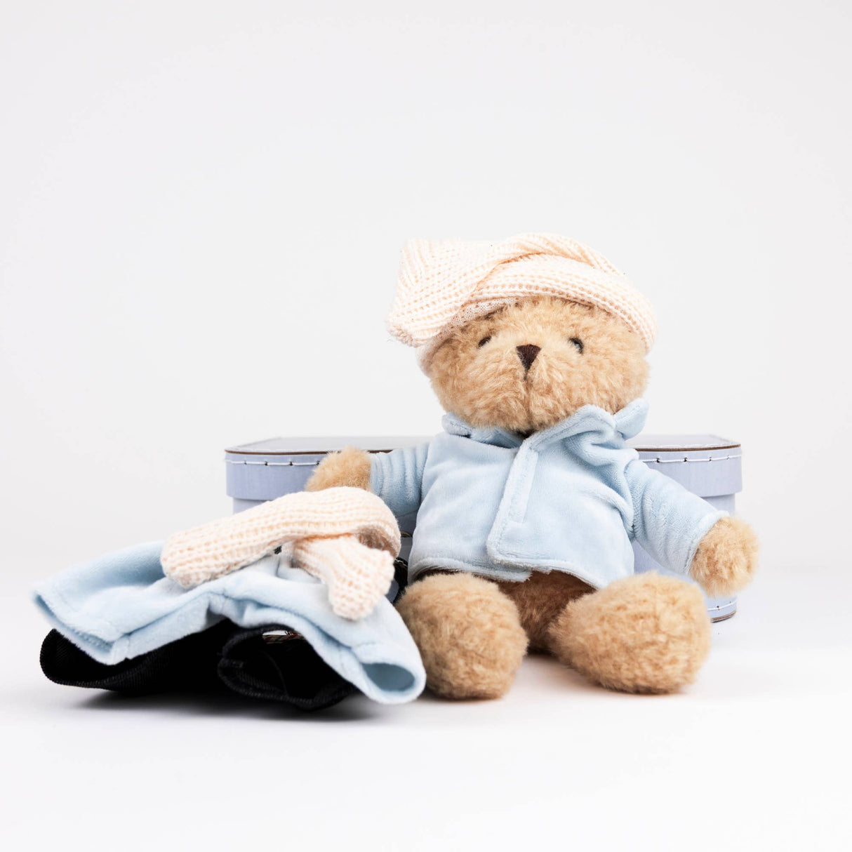 Morris With Clothes In A Case