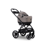 Maeve iso Wind + Roscoe Trek Travel System - side open