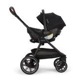Nuna PIPA urbn + TRIV LX travel system in Caviar — at Tadpole, Boston South End