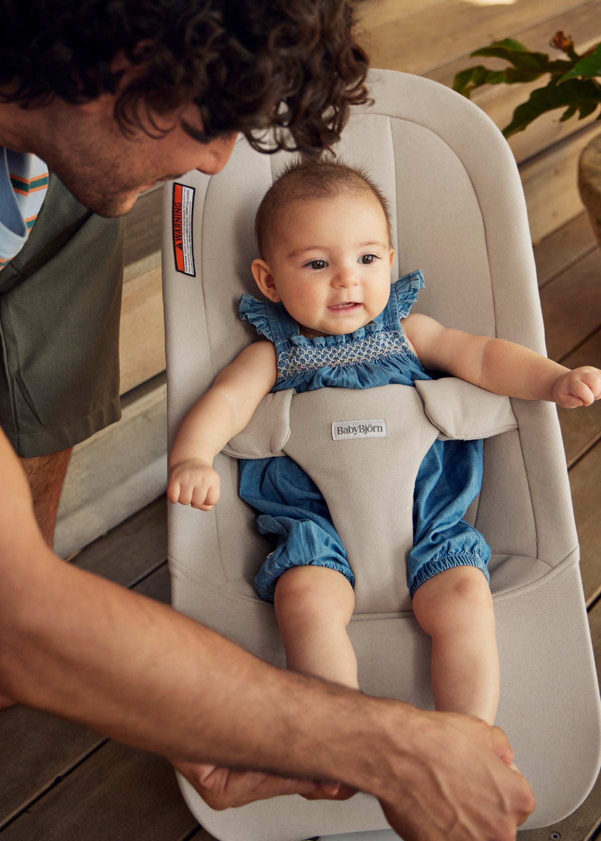 Baby resting in the BabyBjorn Bouncer Begin