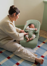 Baby in the BabyBjorn Bouncer Begin, light green brushed woven